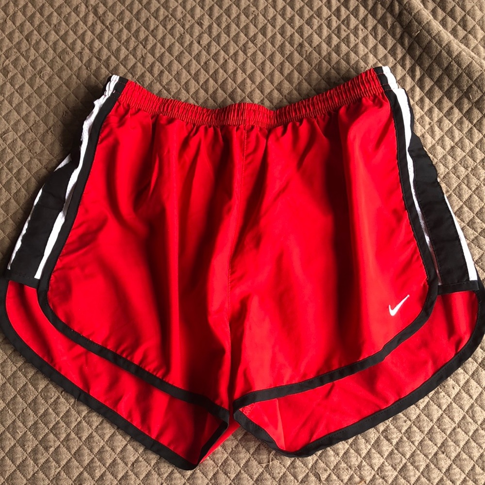 Red Nike shorts